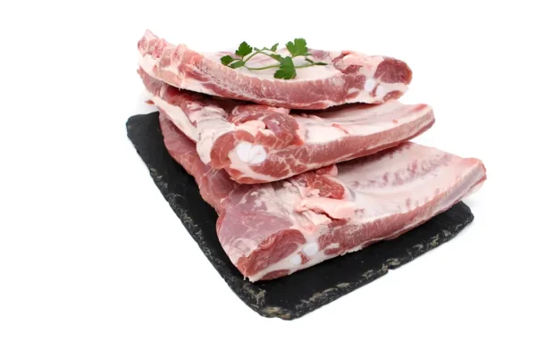 Costillas de cerdo frescas en adobo. 500 g. aprox.